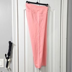 UA women's Pink Reflect Ankle Leggings